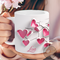 Personalized cracked heart design cup. Close-up of 3D hearts on a pink coffee mug. Sweetheart pink coffee cup with hearts.
